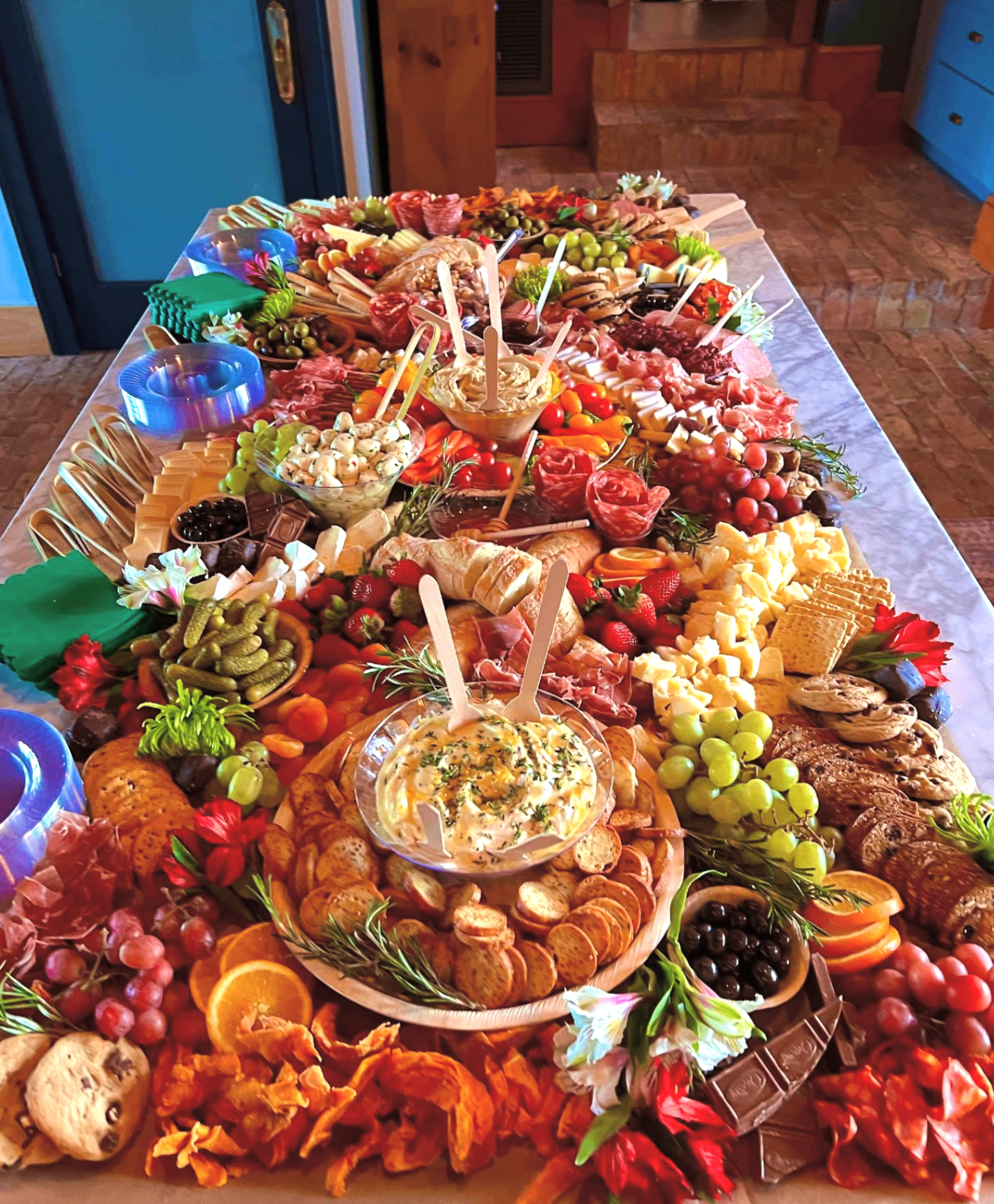 Signature Charcuterie Orlando grazing table with meats, cheeses, fruit, and dips